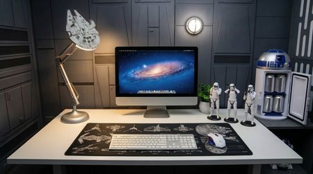 A selection of Stars Wars home office items on a desk in the Death Star