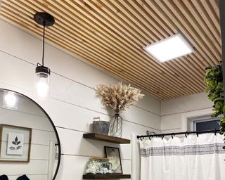 Bathroom ceiling with farmhouse style skinny wood slats