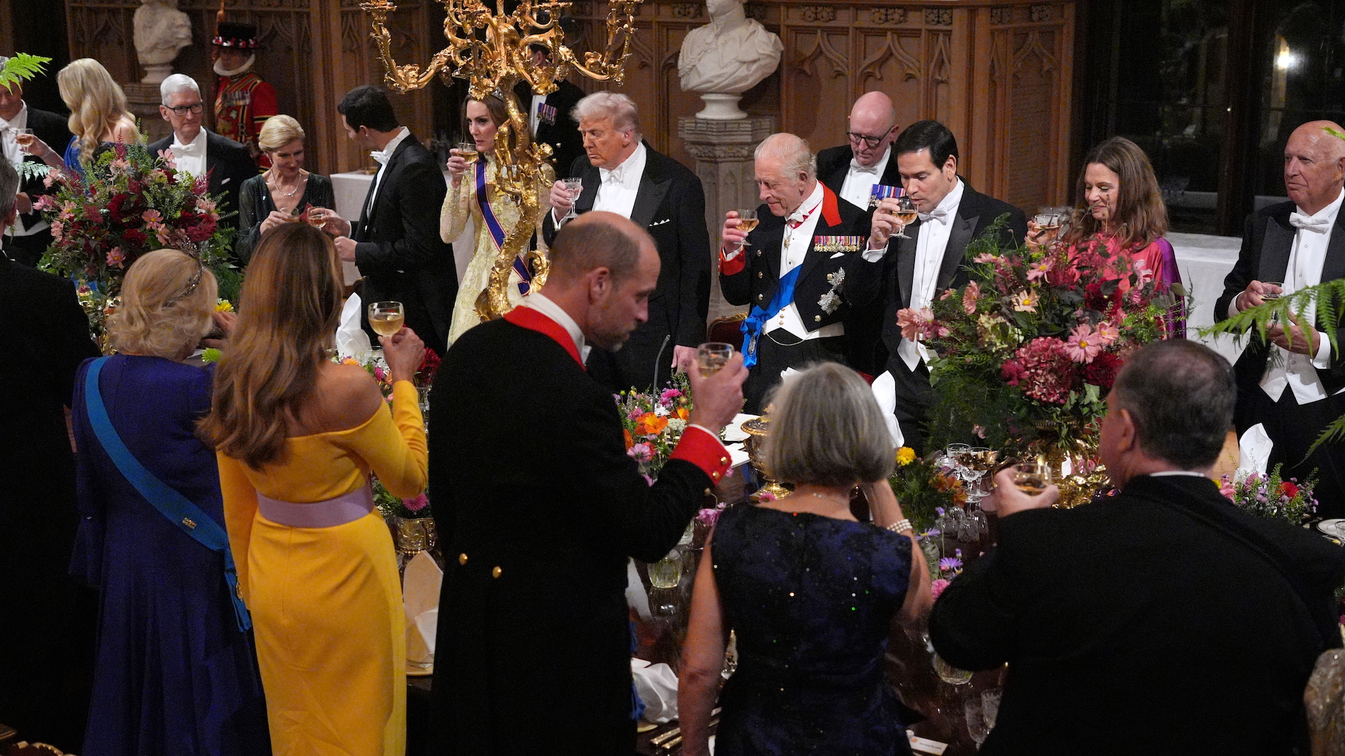 US President Donald Trump, alongside King Charles III, the Princess of Wales, US Secretary of State Marco Rubio, Queen Camilla, First Lady Melania Trump, the Prince of Wales and guests toast during the State Banquet at Windsor Castle on 17 September 2025