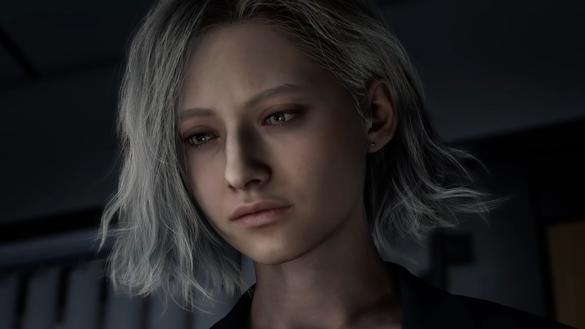 Close-up of Grace Ashcroft from the Resident Evil Requiem reveal trailer. She&#039;s got short, platinum blonde hair and looks like a young adult. 