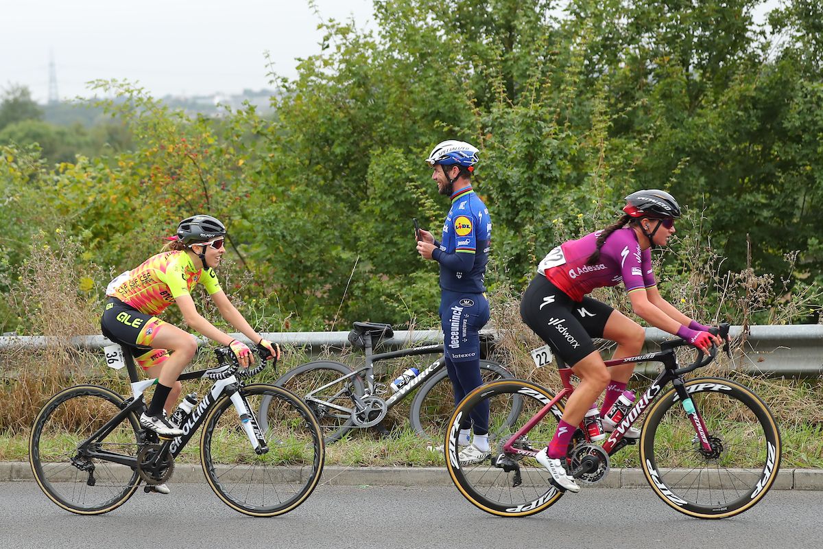 Picture by Alex Whitehead/SWpix.com - 07/10/2021 - Cycling - AJ Bell Women's Tour of Britain - Stage Four: Shoeburyness to Clacton-on-Sea, England - Chantel Blaak of team SD Worx and Sophie Wright of Team Al&Atilde;&copy; BTC Ljubljana in action with pro rider Mark Cavendish spectating on the road side
