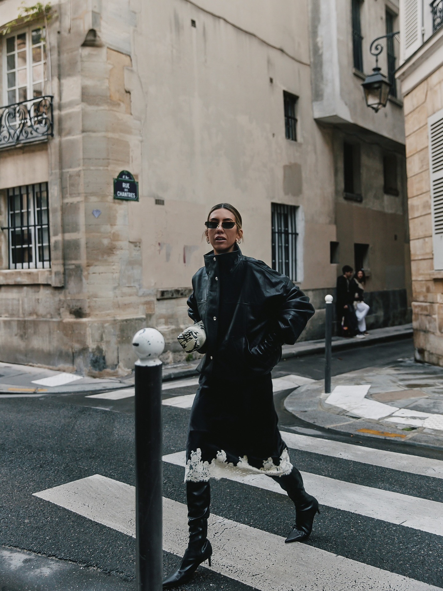 Influencer wearing knee high boots for winter.