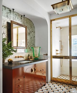 Decorative bathroom with mirrored wall