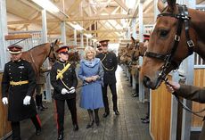 The-Duchess-of-Cornwall-in-Monarch-Stables-at-The-Kings-Troop.jpg