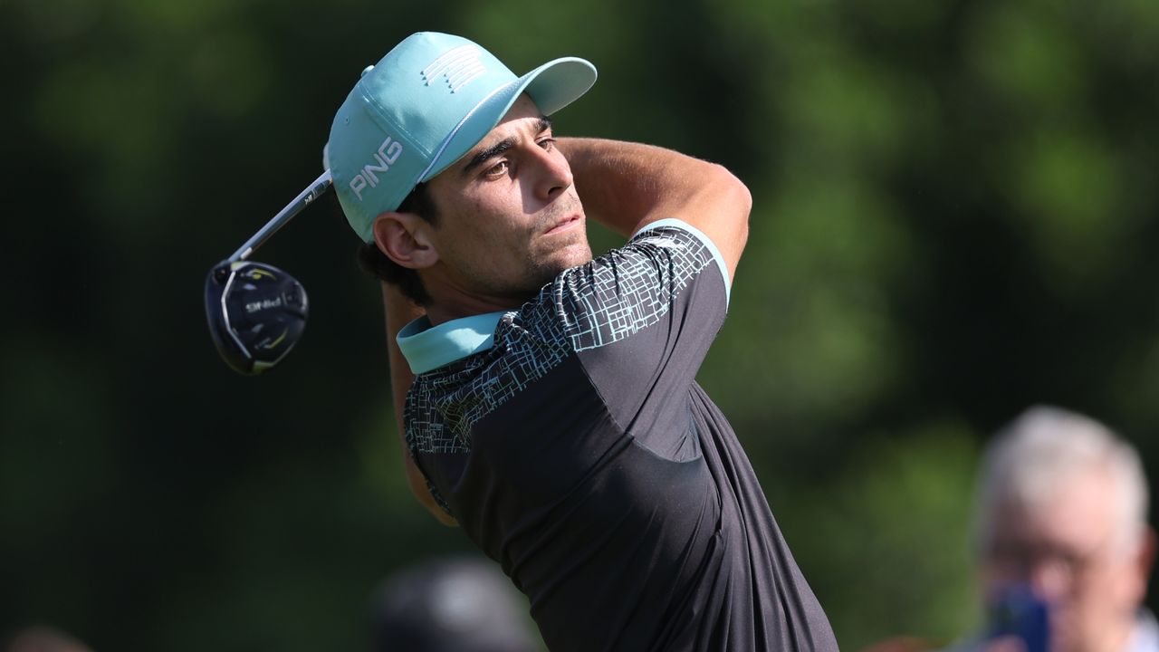 Joaquin Niemann takes a shot in the fourth round of the Dubai Desert Classic