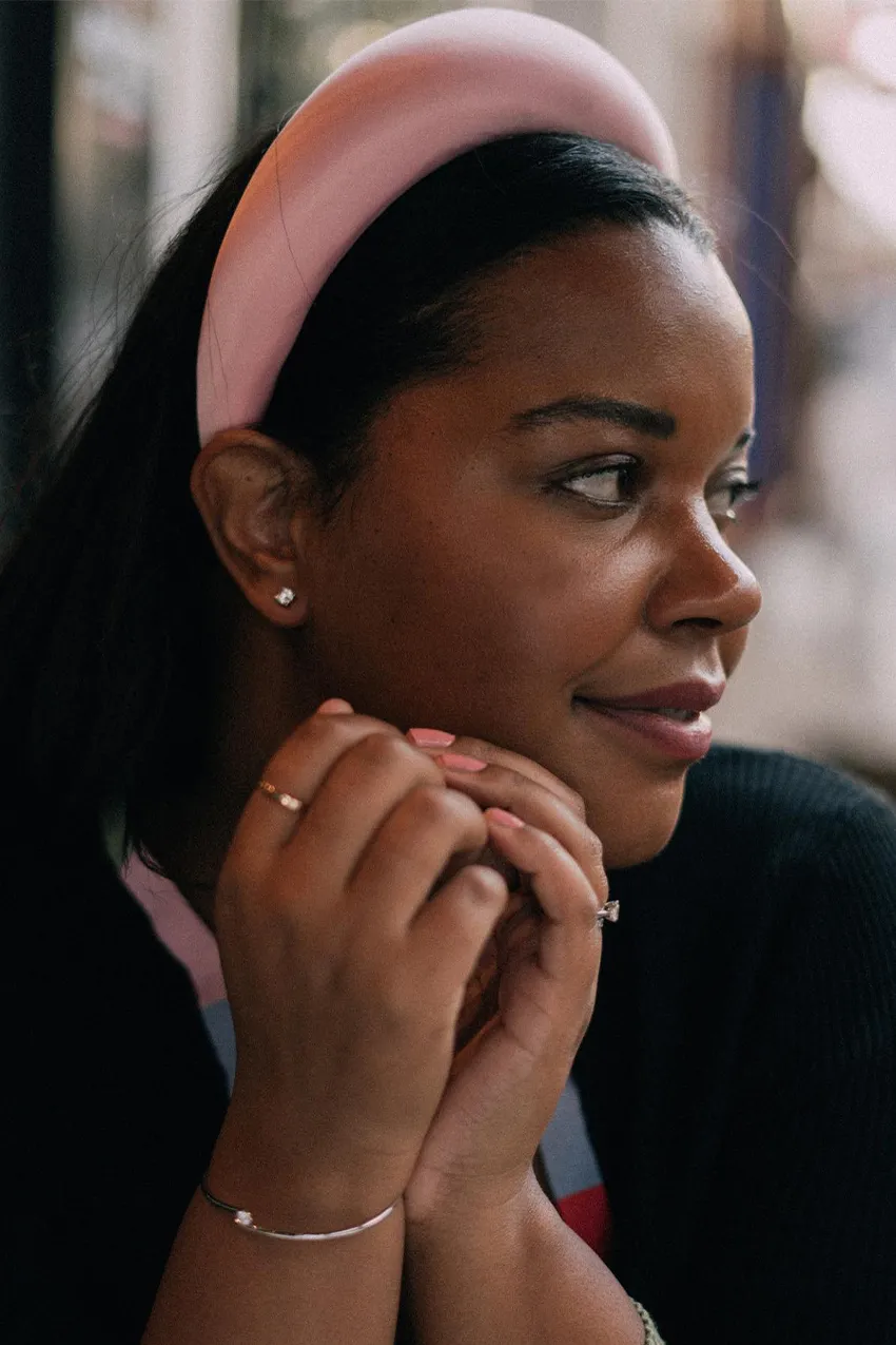 Woman wears diamond earrings