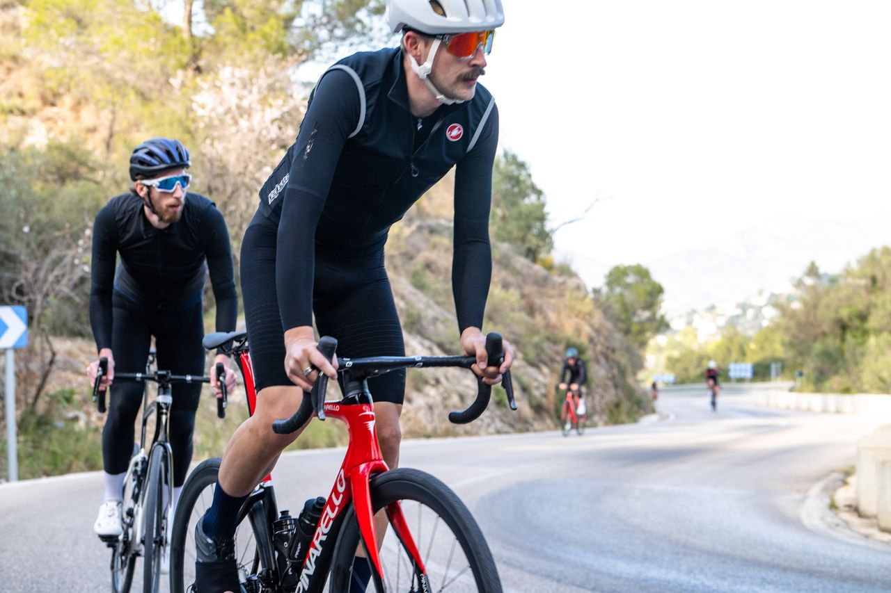 A red and black pinarello F road bike