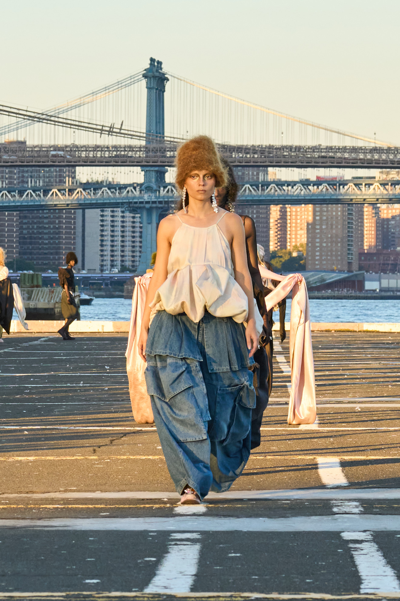 A model wore the barrel jeans trend on the Collina Strada Spring 2026 runway