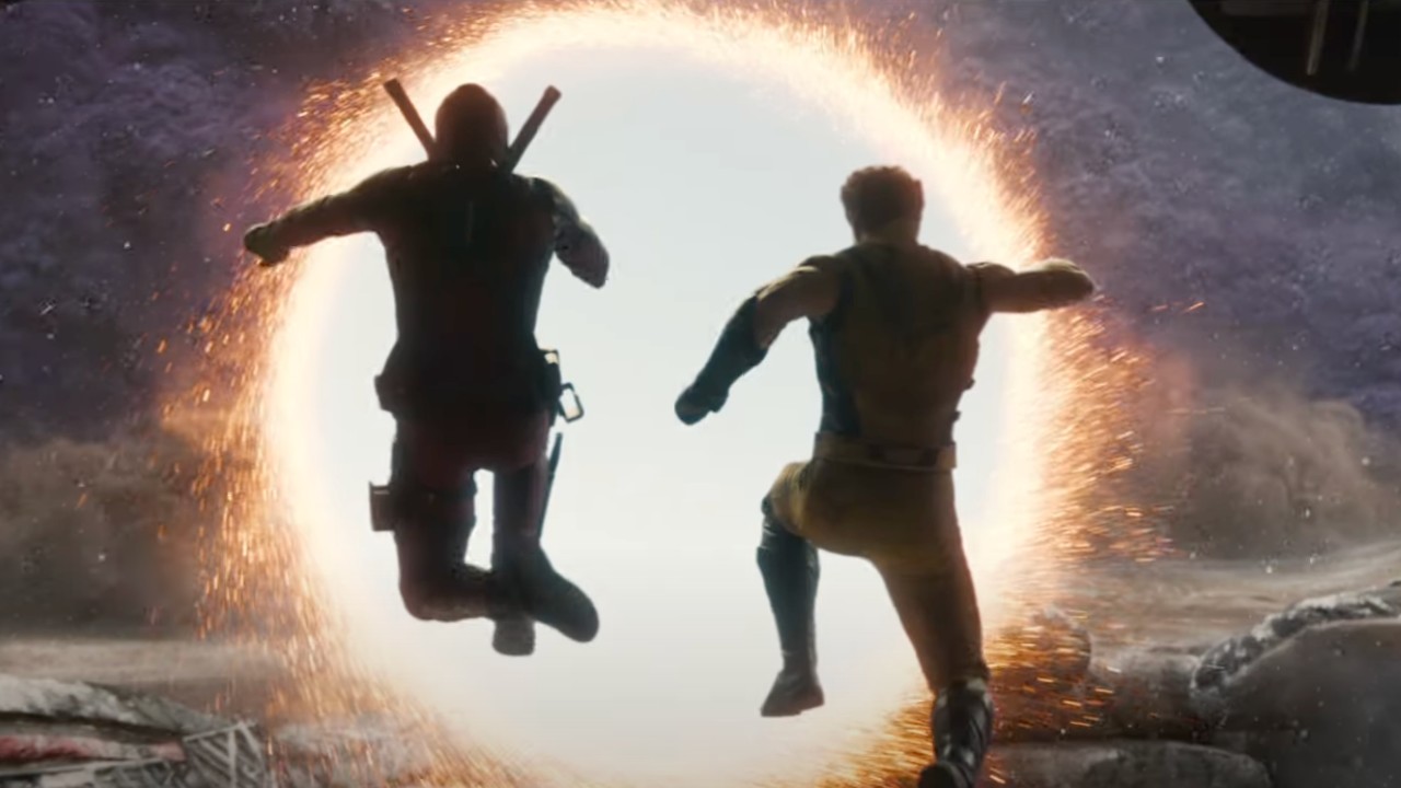 Deadpool jumping through portal with Wolverine