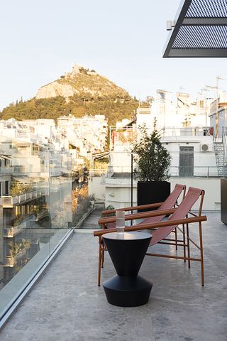 terrace with view of lycabetus hill at the social athens