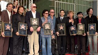 (L-R) Journey bandmembers Jonathan Cain, Steve Perry, George Tickner, Neal Schon, Aynsley Dunbar (rear), Robert Fleischman, Ross Valory, and Steve Smith (beret), pictured in 2005