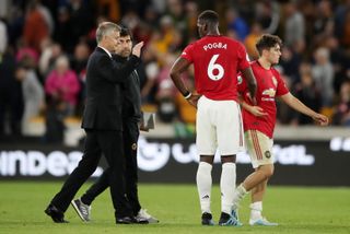 Solskjaer (left) insists he is happy with the players making the decision
