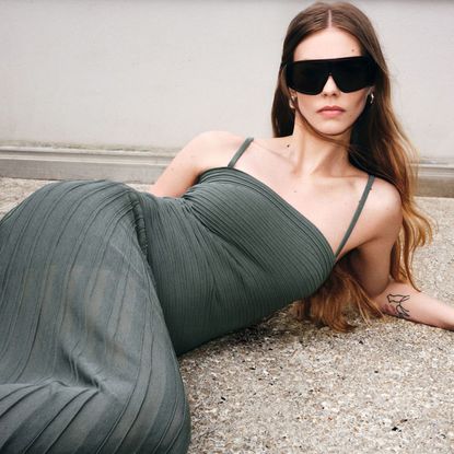 woman wearing one of the best holiday outfits from cos