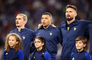 Antoine Griezmann, Kylian Mbappe and Olivier Giroud of the France squad
