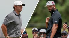 Rory McIlroy and Jon Rahm walk off the green
