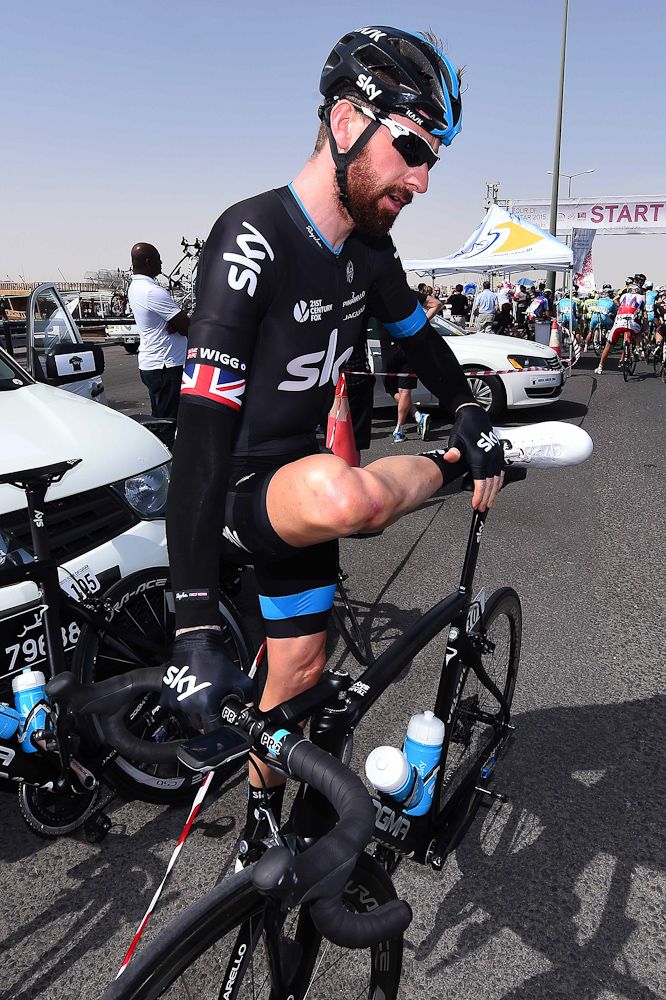 Bradley Wiggins stretches before the start.