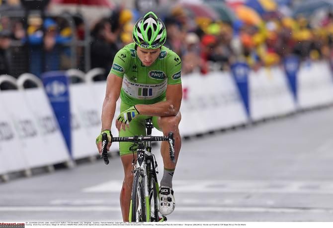 Peter Sagan (Cannondale) rolls to the finish line after crashing at the end of stage 19