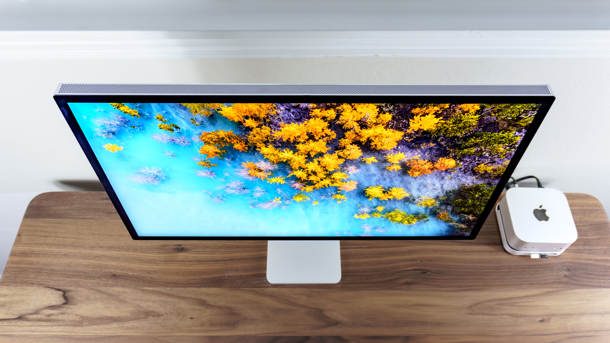 The Apple Studio Display XDR on a desk seen from above