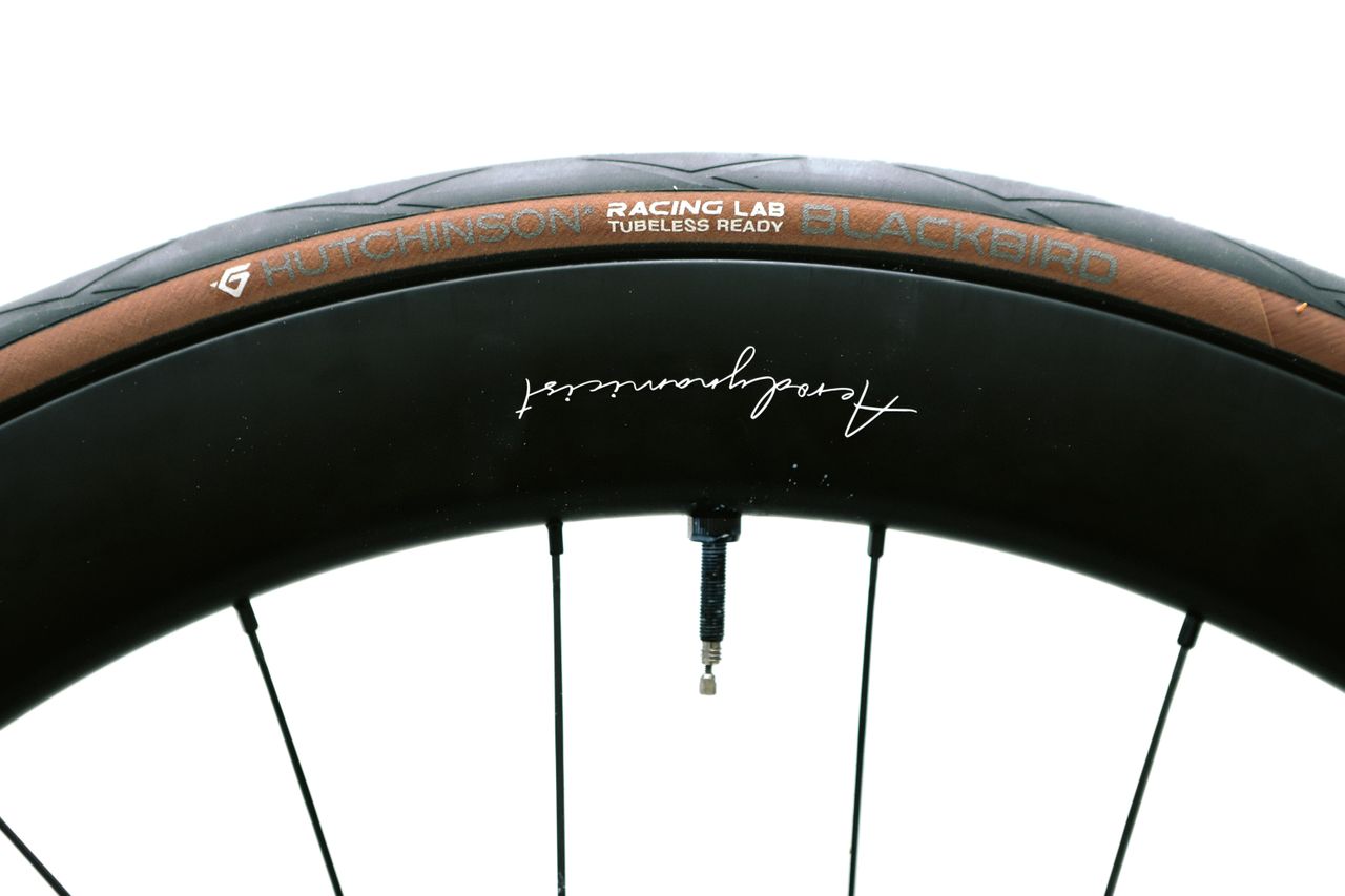 A tan bicycle tyre on a white background