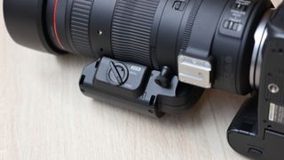 Close up of Canon PZ-E2 Power Zoom Adapter on a camera lens