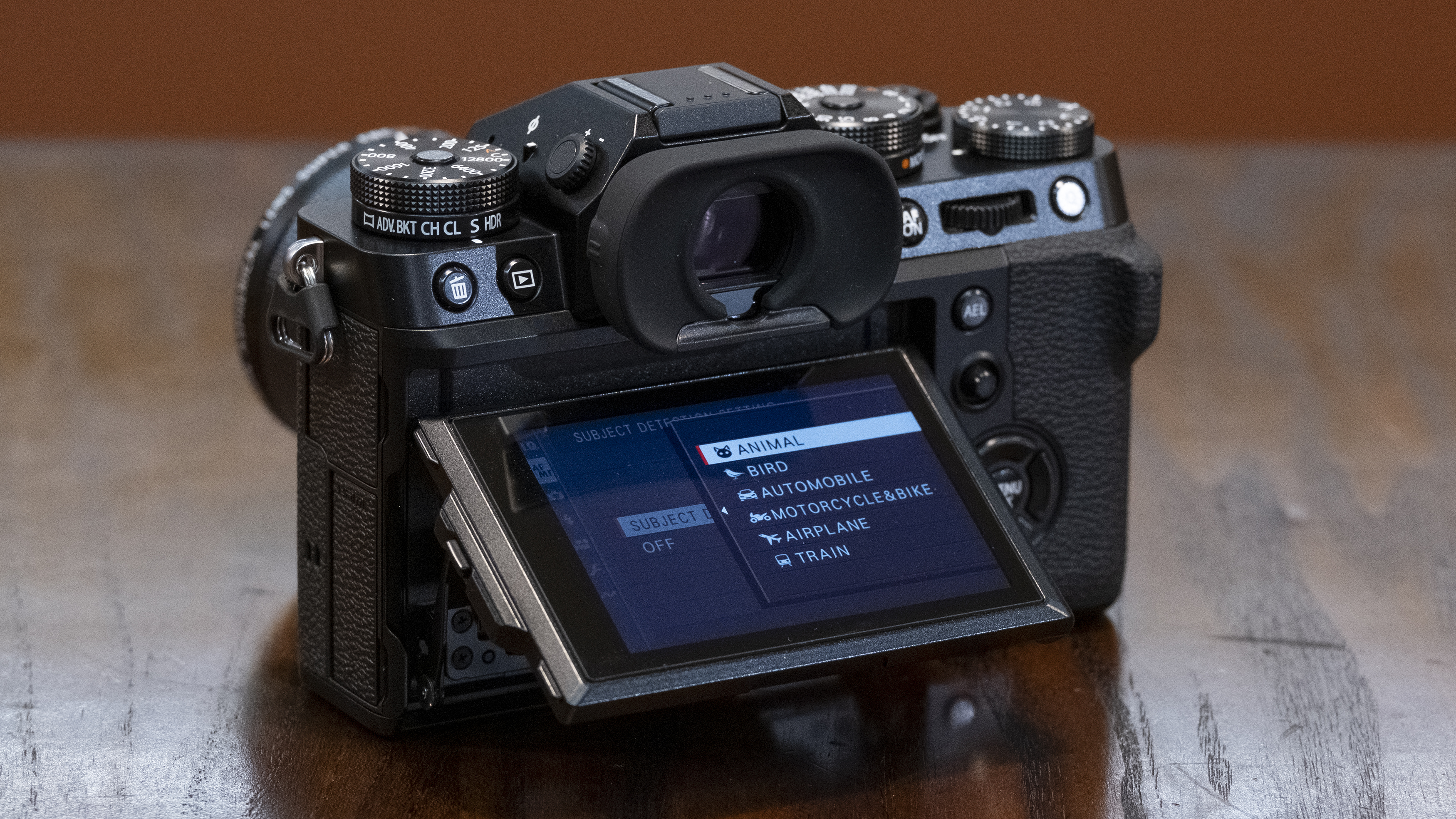 The Fujifilm X-T5 camera sitting on a table