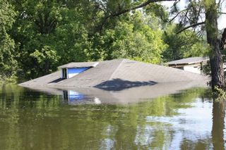 The only part of this home in Vicksburg Mississippi above water on May 13, 2011 was the roof.