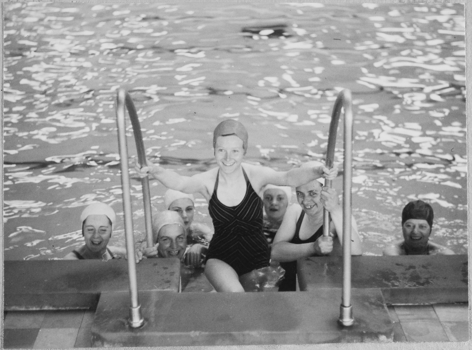 Members of the WAAF (Women's Auxiliary Air Force) in their bathing costumes, posed for the camera at the Derby Baths