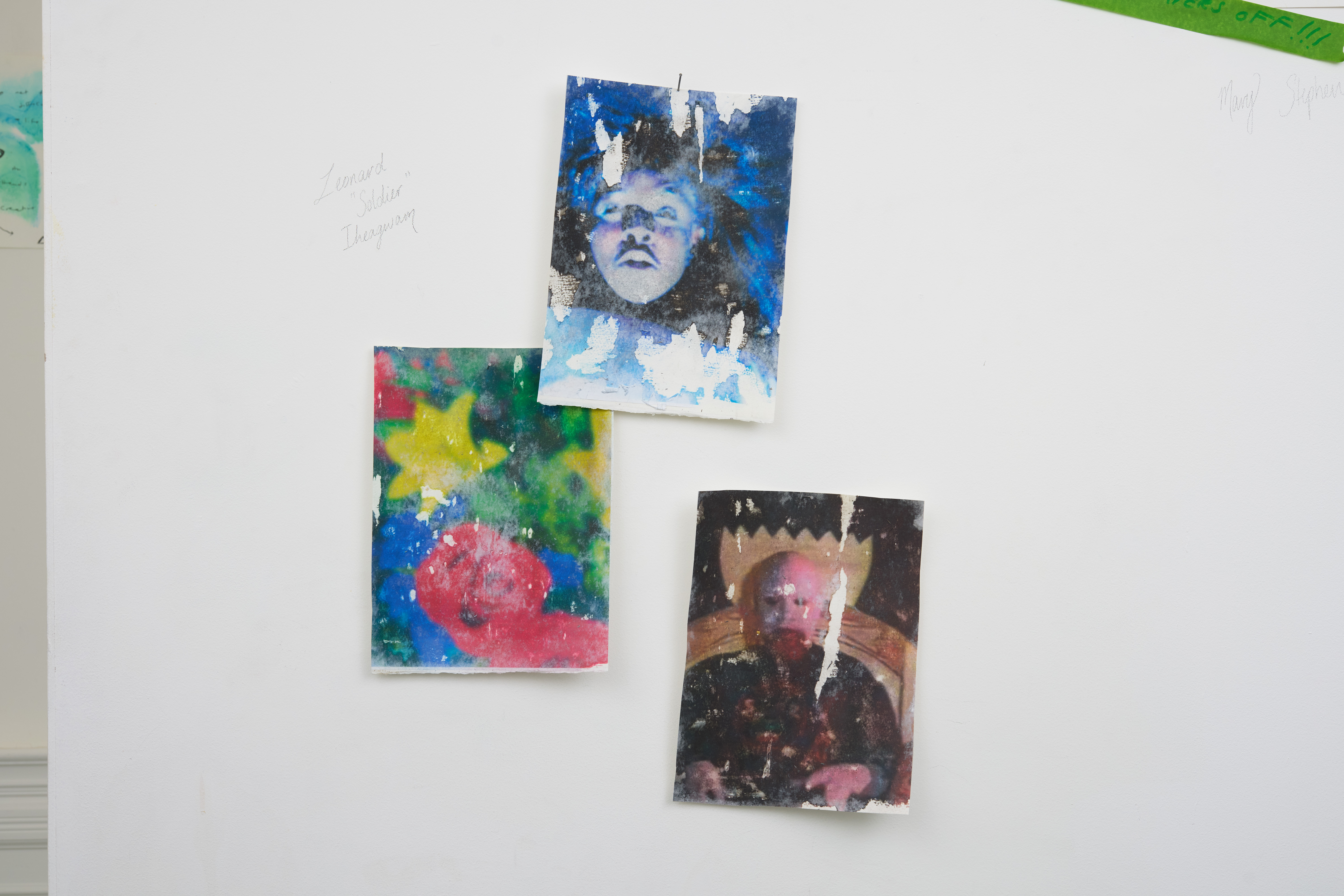 images pinned to wall