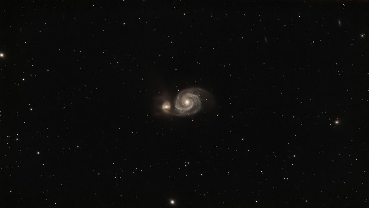swirls of gas on a starry background