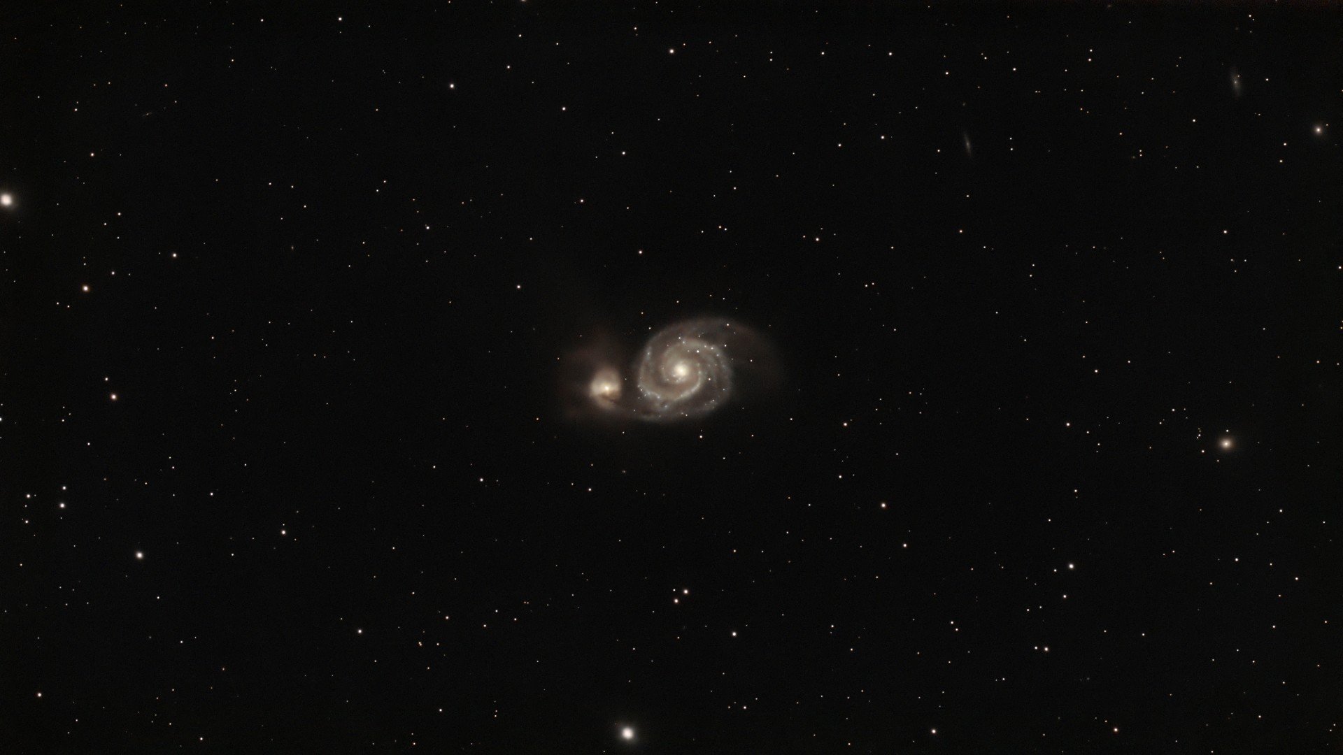 swirls of gas on a starry background