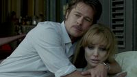 Roland (Brad Pitt) and Vanessa (Angelina Jolie) embrace in By the Sea.