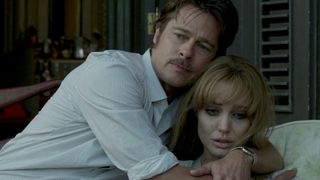 Roland (Brad Pitt) and Vanessa (Angelina Jolie) embrace in By the Sea.