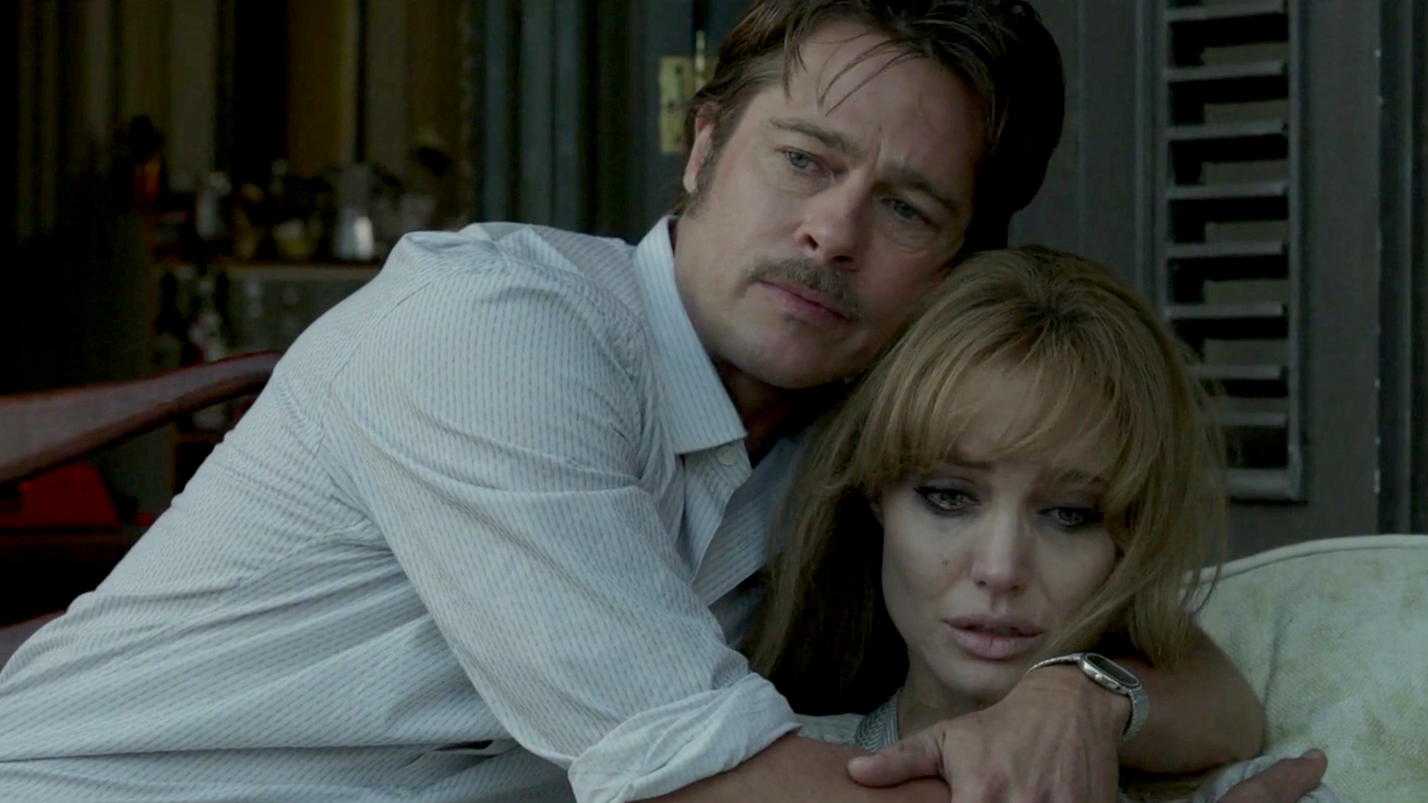 Roland (Brad Pitt) and Vanessa (Angelina Jolie) embrace in By the Sea.
