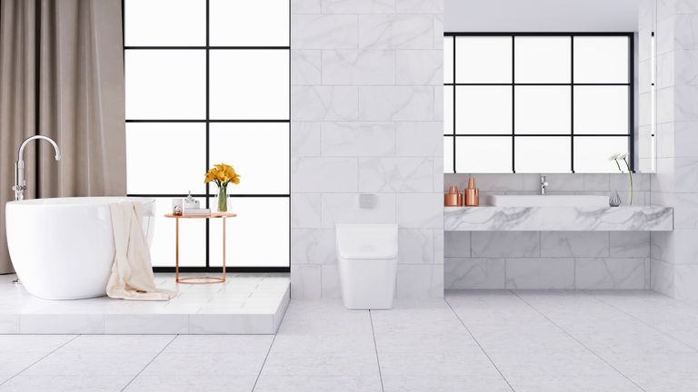 clean tile floor in monochrome bathroom