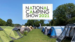 Tents in a field with National Camping Show logo