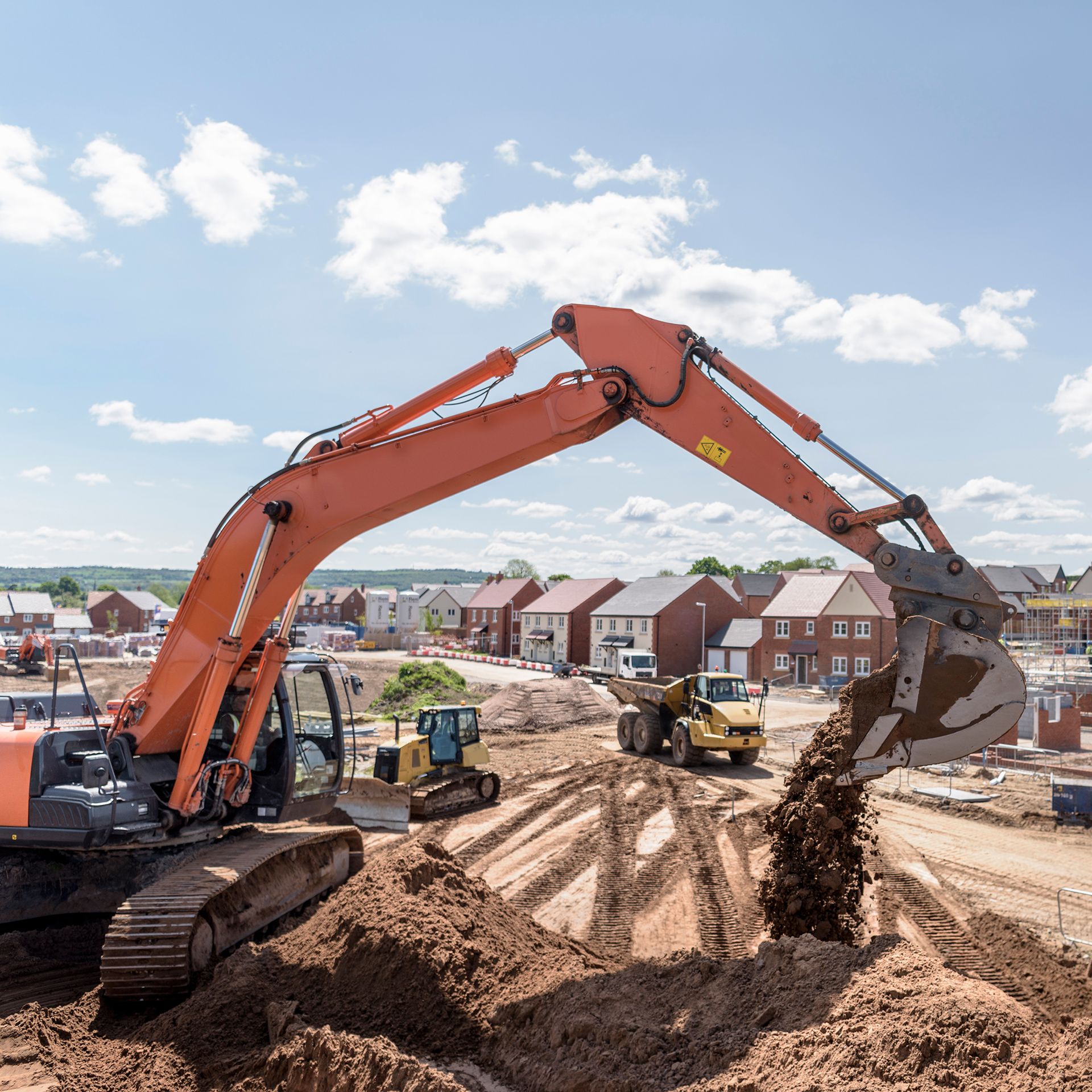 Digger on residential building site