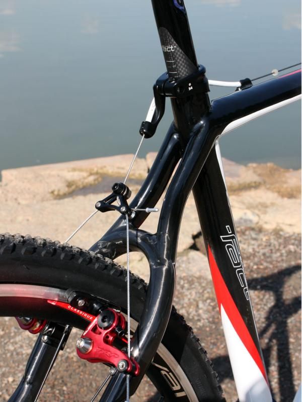 The rear brake housing stop is integrated into the seatpost collar