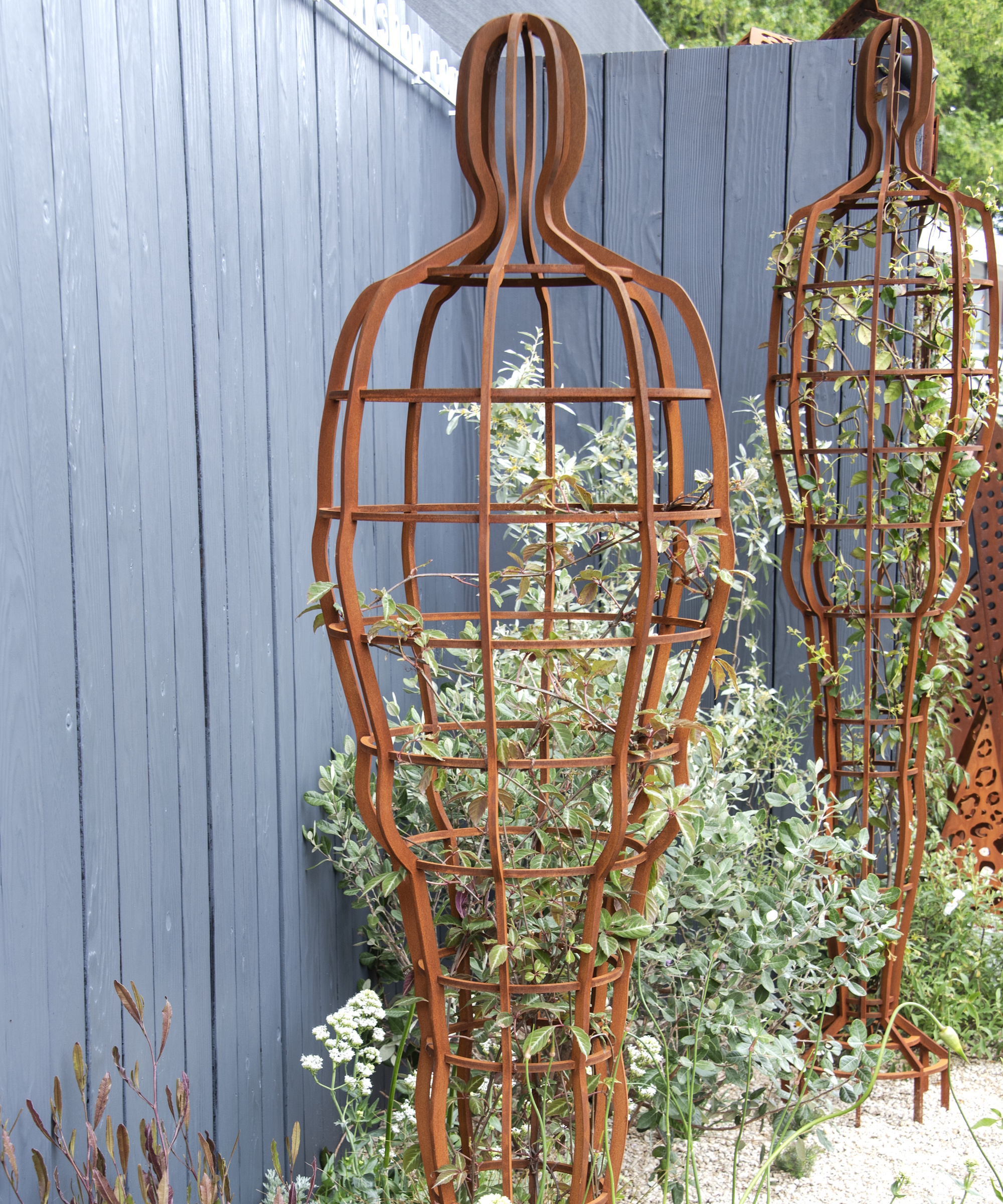 Sculptures with vines growing up them at RHS Chelsea 2026