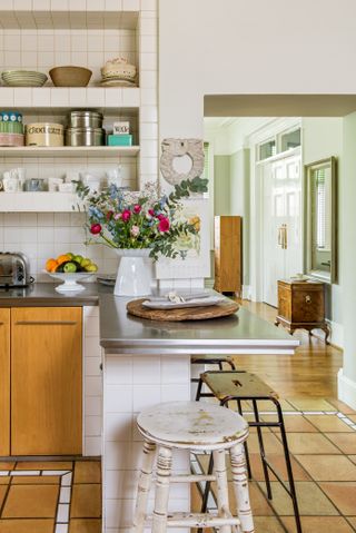 breakfast bar in Victorian home with view to hall