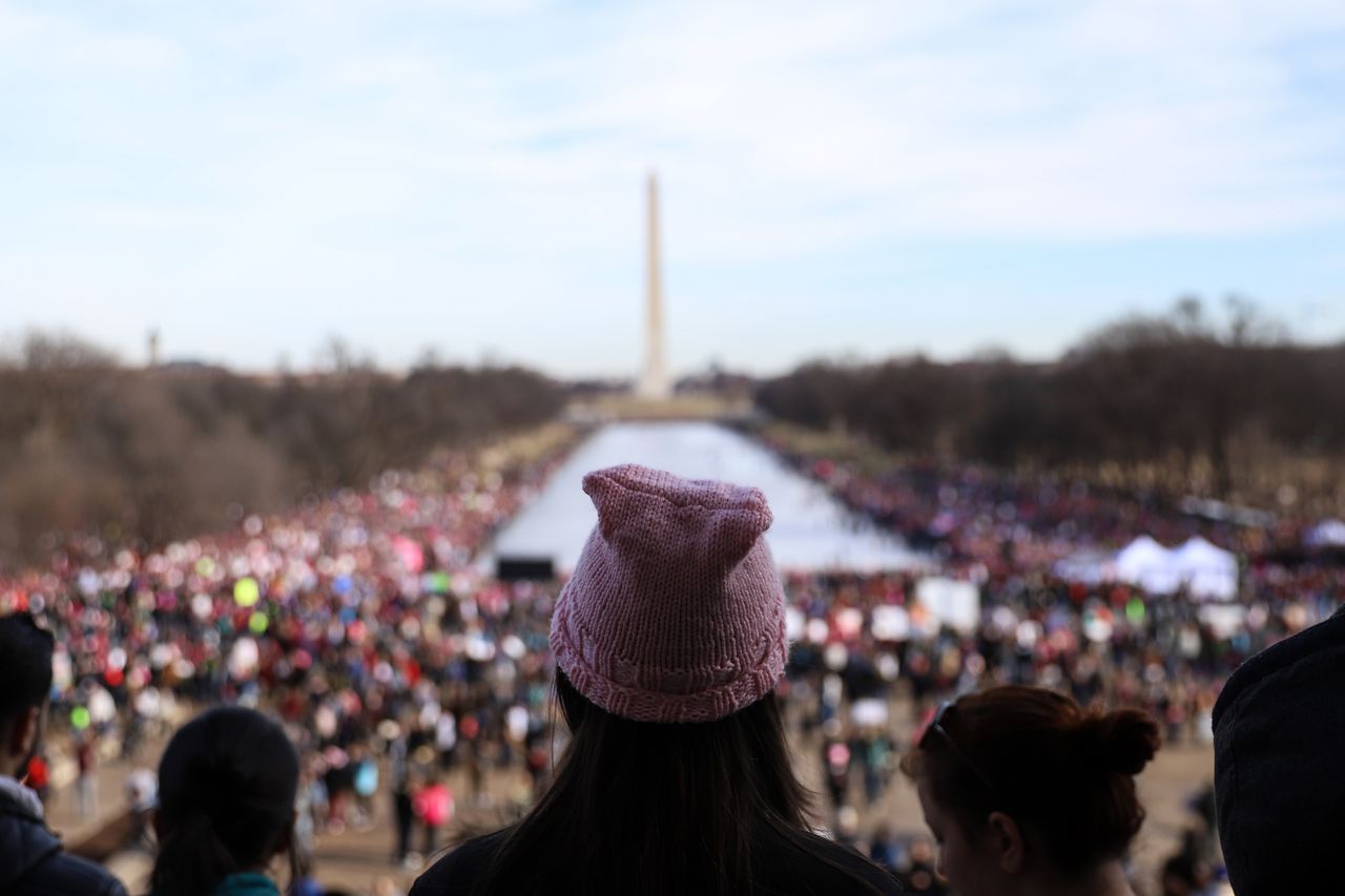 People gather at the Lincoln Memorial reflecting pool to rally before the Women&amp;#039;s March on January 20, 2018 in Washington, D.C.