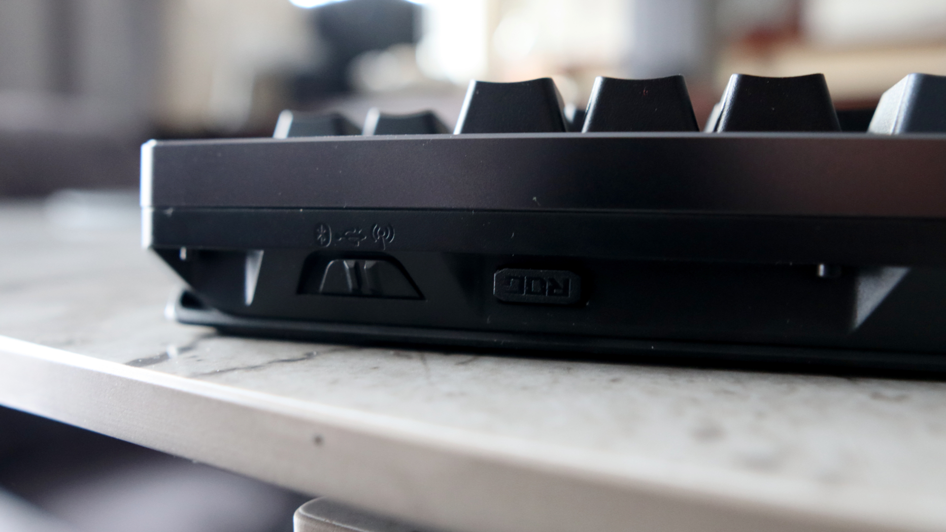 Asus ROG Azoth 96 HE on a desk.