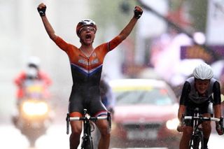 Marianne Vos (Netherlands) wins the Olympic road race from Elizabeth Armitstead (Great Britain) and Olga Zabelinskaya (Russia)