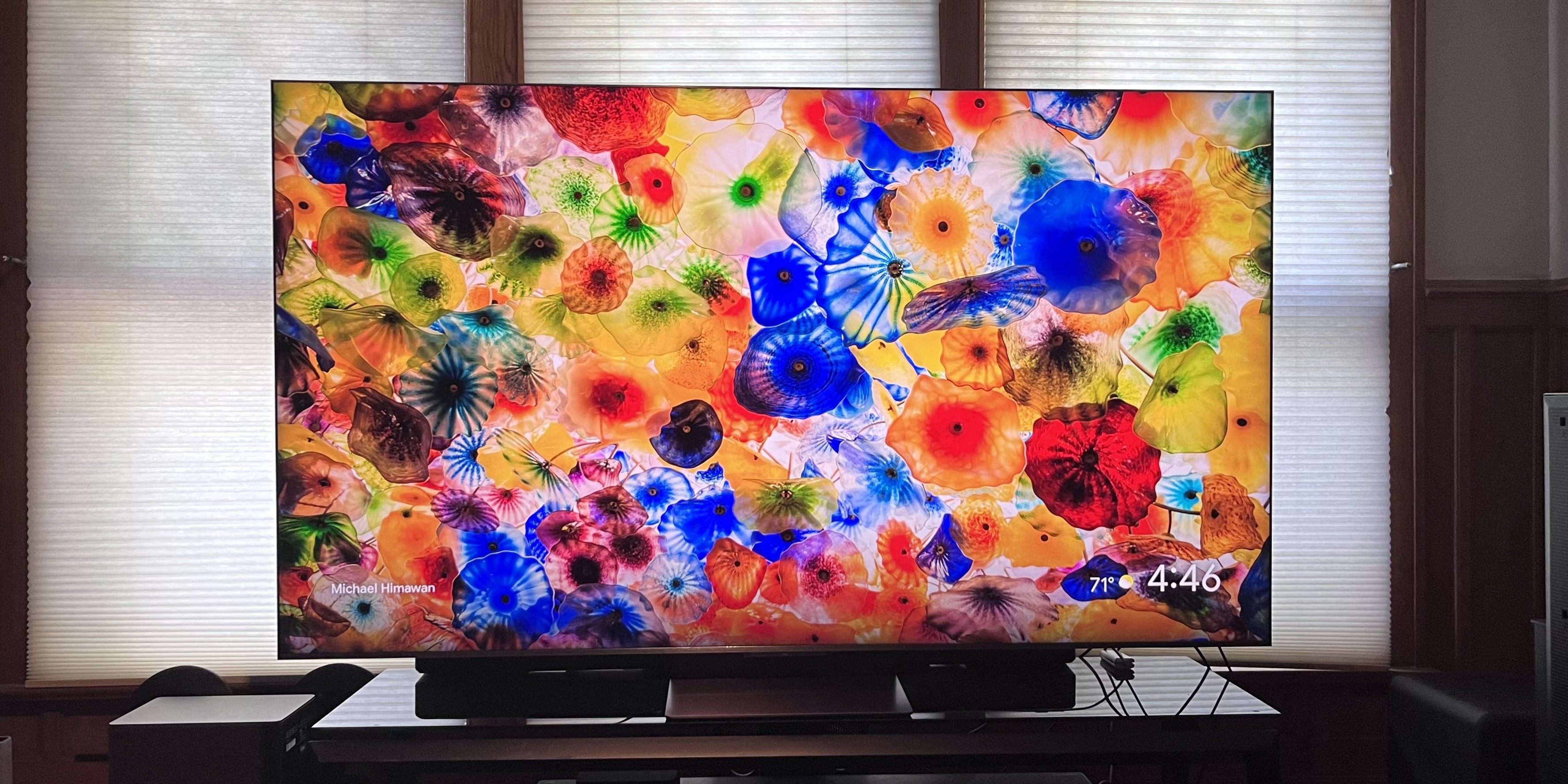 TCL QM9K showing colorful abstract image