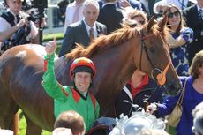 Johnny Murtagh riding Dancing Rain wins the Investec Oaks
