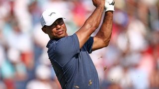 Tiger Woods takes a shot in the first round of the US Open