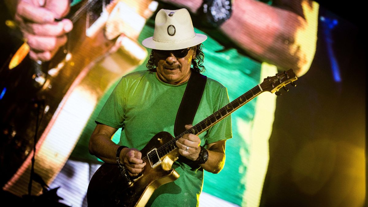 The Mexican and American musician Carlos Santana pictured on stage as he performs live at Street Music Art in Assago Milan, Italy