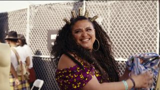 Michelle Buteau smiling in Survival of The Thickest Season 2