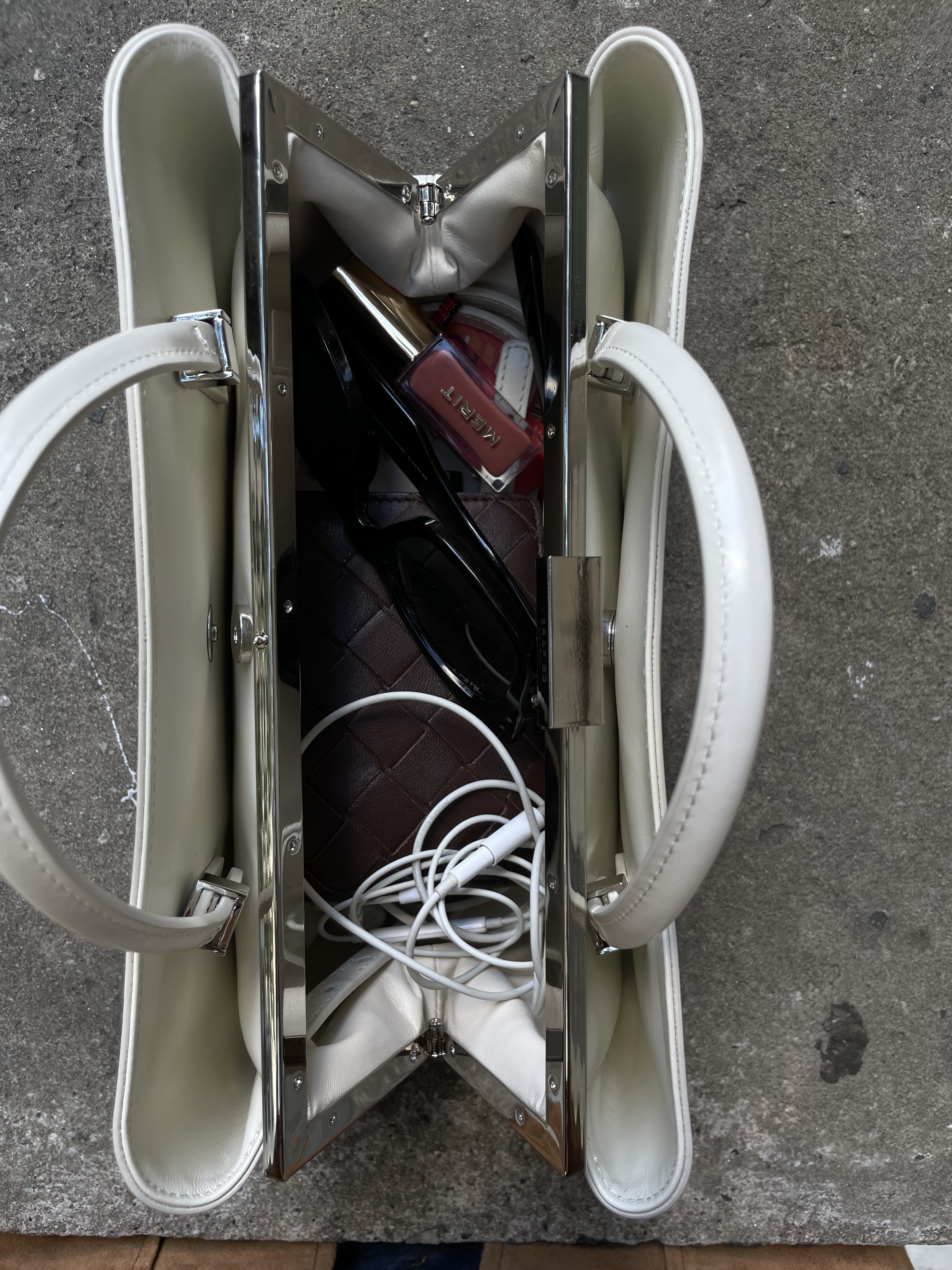 Anna LaPlaca carrying a Verafied Eclair Bag