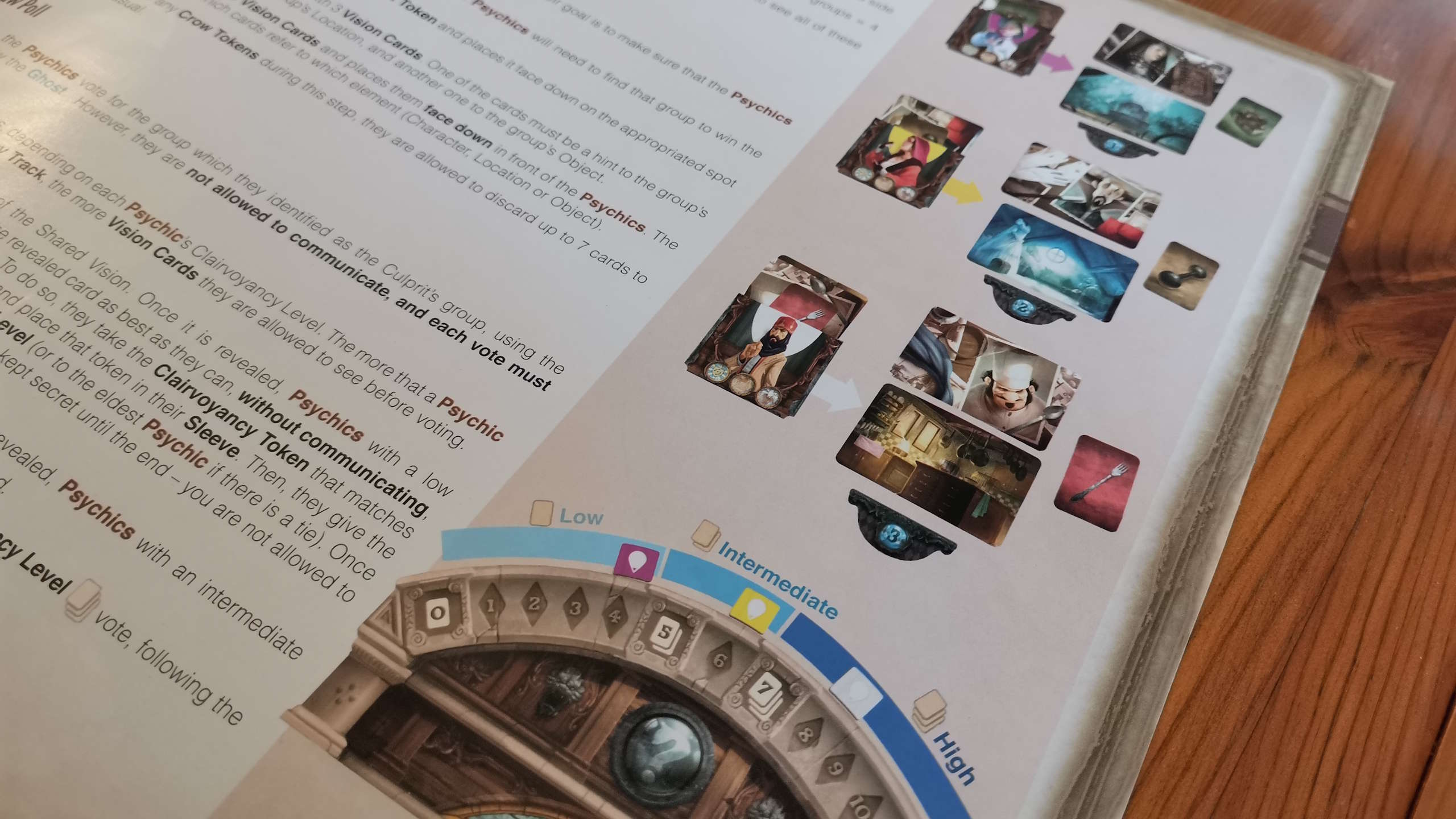 The Mysterium rulebook, open on a wooden surface
