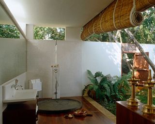 outdoor bathroom with bamboo screen